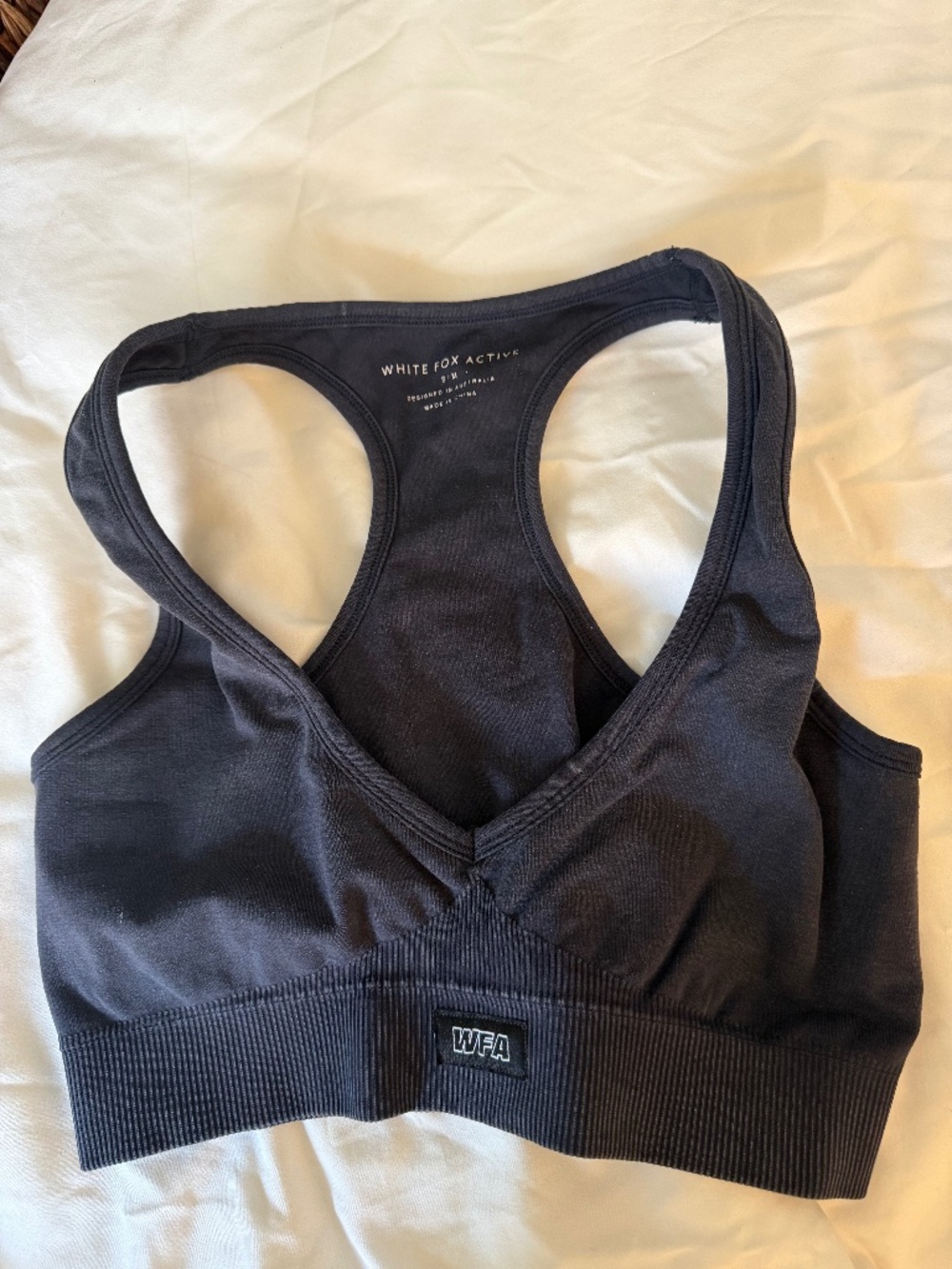 White Fox Active black racerback sports bra – WFA patch, size S/M